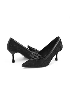 Side view of elegant black lace pointed-toe high heels with bow detail