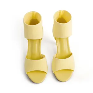 Stylish yellow knitted peep-toe high-heeled sandals featuring sleek stiletto heels