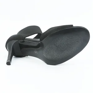 Black flyknit stiletto sandals showing the sole and heel detail