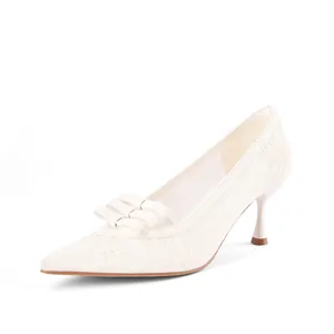 Elegant French-style white lace pointed-toe high heels featuring decorative bow details