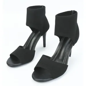 Elegant black flyknit open-toe stiletto sandals with ankle support and thin heels