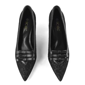Elegant black pointed toe high heels with lace texture and triple bow detail on the front