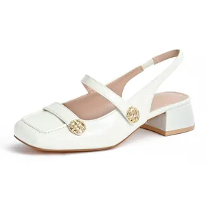 Elegant white square-toe slingback Mary Jane sandals with gold decorative buttons and block heel.