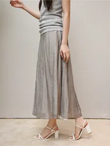 Elegant white square toe block heel sandals with thin straps shown on a female model