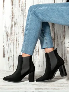 Elegant black suede pointed-toe Chelsea boots with chunky high heels for women's autumn style