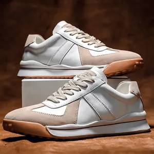 Retro men's GAT sneakers in white and beige leather with gum sole for casual wear.