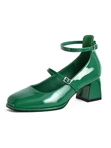 Side profile of a green patent leather Mary Jane shoe with square toe and chunky heel.