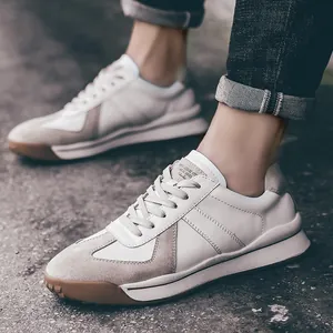 Stylish men's retro German Army Trainers with suede accents and gum sole for casual wear.
