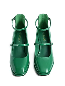 Detailed top view of green patent leather square-toe Mary Jane heels with ankle straps