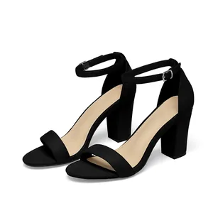 Elegant black block heel sandals featuring an adjustable ankle strap and matte finish.