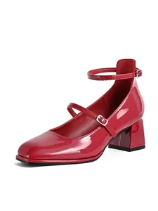 Detail showing red patent leather Mary Janes with square toe and block heel shoes