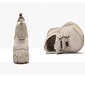 Detailweergave van ademende outdoor mesh sneakers voor heren met zachte zool en trekkoordluiting.