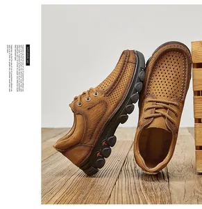 Ademende bruine leren vrijetijdsschoenen voor heren met geperforeerd ontwerp op hout