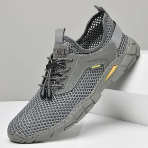 Sneakers da uomo in mesh traspirante grigio con design a nido d'ape e lacci elastici