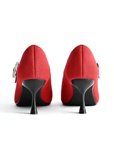 Rear view of red pointed Mary Jane heels showing elegant black kitten heels.