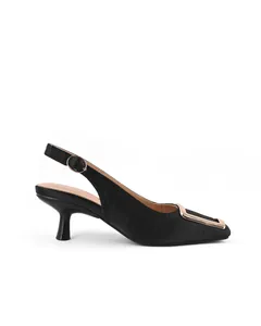 Close-up detail view of elegant black slingback heels with square toe and gold buckle.