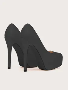 Rear view of elegant black suede high heel pumps featuring stiletto heels and thick platform