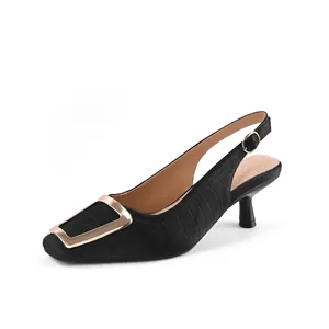 Elegant black slingback pumps with square toe and gold buckle detail
