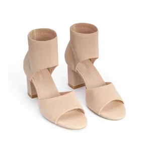 Nude fly-knit peep-toe sandals with chunky block heels and sock-style ankle cuffs
