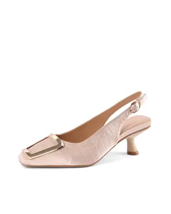 Elegant beige croc-embossed slingback pumps with gold buckle detail and kitten heel.