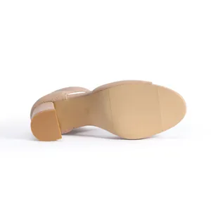 Detail view of flyknit chunky heel sandal outsole with non-slip texture and size 6.5 stamp