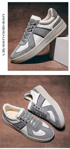 Primo piano di sneakers GAT da uomo in pelle scamosciata grigia e mesh traspirante