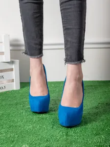 Close-up front view of elegant bright blue suede platform high heel pumps on a model