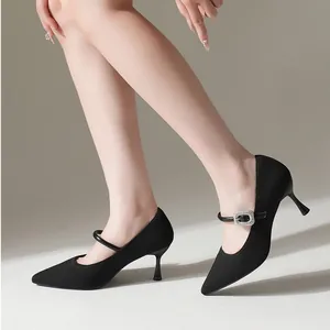 Elegant black pointed-toe Mary Jane stiletto heels with sparkly crystal buckle strap