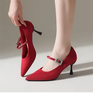 Elegant red pointed-toe Mary Jane high heels with sparkling rhinestone buckle strap