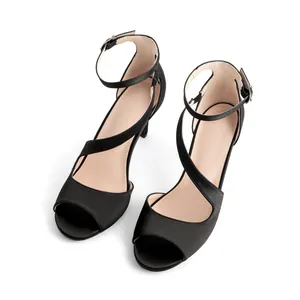 Elegant black satin peep-toe high heels featuring ankle strap and crossover design
