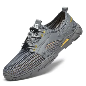 Lichtgewicht grijze ademende holle mesh heren hardloopschoenen met snelvetersysteem