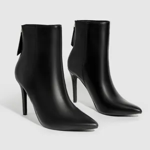 Sleek black faux leather stiletto ankle boots featuring a sharp pointed toe design