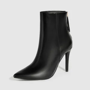 Detailed view of elegant black pointed-toe stiletto high-heel ankle boots for women