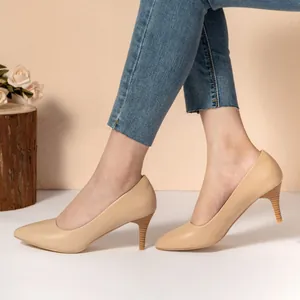 Elegant apricot pointed-toe pumps with mid-height kitten heels for office and party wear