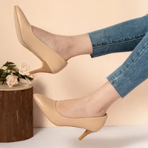 Elegant apricot pointed-toe kitten heel pumps with smooth faux leather finish