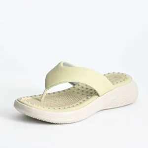 Detailed side view of women's platform flip-flops with massage footbed and soft sole