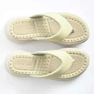 Top view of women's platform thong sandals featuring a comfortable massage footbed