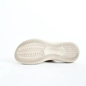 Detailed macro view showing the anti-slip textured cream outsole for platform sandals.