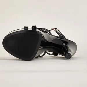 Detailed view of 17cm platform stiletto sandals in glossy black patent leather finish