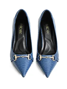 Elegant blue crocodile embossed pointed-toe pumps featuring a classic gold metal buckle.