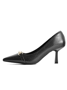 Side detail of black pointed-toe pumps with crocodile texture and gold buckle