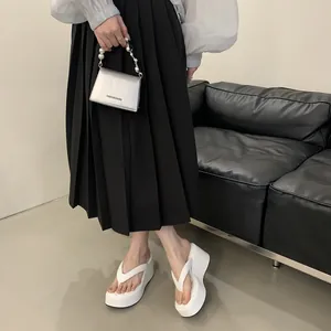 Stylish women's summer white platform wedge flip-flops with thick soles for height