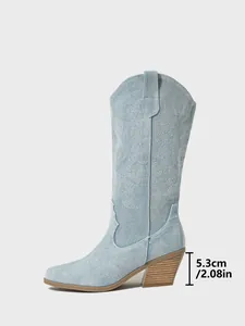 Embroidered denim western boots featuring a 5.3cm chunky wood-grain heel and pointed toe.