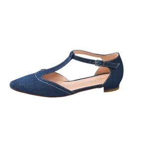 Women's elegant blue denim pointed-toe flat shoes featuring a stylish T-strap design