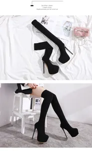 Detailed view of black thigh-high stiletto boots with high platform