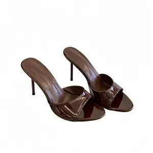 Glossy brown patent leather high heel mule sandals with open toe and stiletto heel