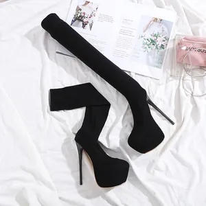 Detail view of black over-the-knee boots with 16cm stiletto heel and platform