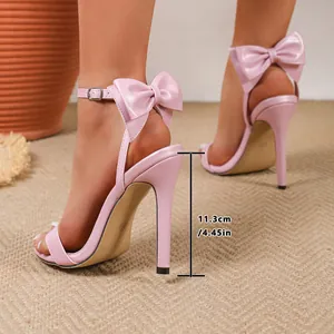 Detailed view of pink bow high heels with 11.3cm stiletto and elegant ankle strap