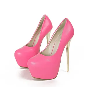 Detail of pink platform stiletto pumps with sleek metallic gold heels for nightlife