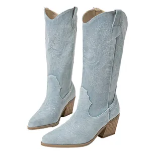 Stylish light blue denim western cowboy boots with retro floral embroidery and pointed toe